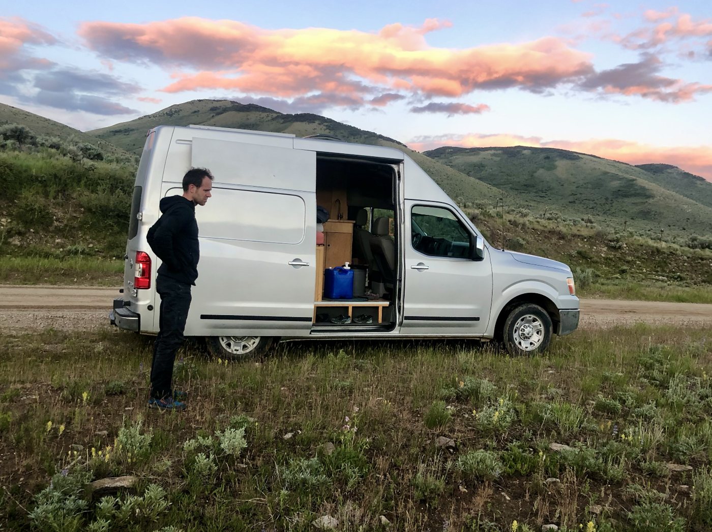 Michal and the van we built out in 2018.